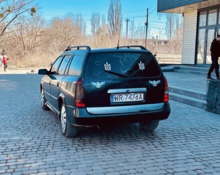 Черный Опель Астра, объемом двигателя 2 л и пробегом 400 тыс. км за 1250 $, фото 2 на Automoto.ua