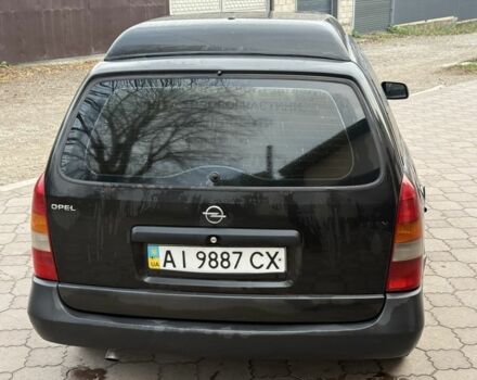 Черный Опель Астра, объемом двигателя 1.7 л и пробегом 666 тыс. км за 1375 $, фото 5 на Automoto.ua