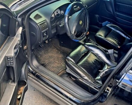 Чорний Опель Астра, об'ємом двигуна 2 л та пробігом 440 тис. км за 2000 $, фото 5 на Automoto.ua