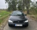 Черный Опель Астра, объемом двигателя 2 л и пробегом 258 тыс. км за 952 $, фото 7 на Automoto.ua