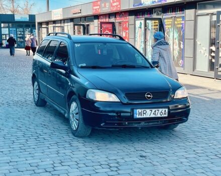 Черный Опель Астра, объемом двигателя 2 л и пробегом 400 тыс. км за 1250 $, фото 1 на Automoto.ua