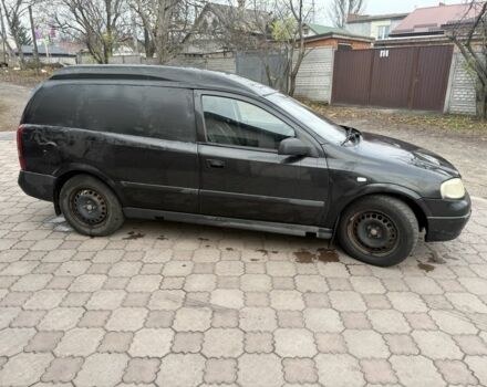 Черный Опель Астра, объемом двигателя 1.7 л и пробегом 666 тыс. км за 1375 $, фото 3 на Automoto.ua