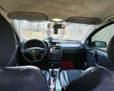 Черный Опель Астра, объемом двигателя 2 л и пробегом 400 тыс. км за 1250 $, фото 3 на Automoto.ua