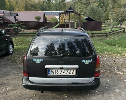 Черный Опель Астра, объемом двигателя 2 л и пробегом 258 тыс. км за 952 $, фото 3 на Automoto.ua