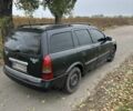 Черный Опель Астра, объемом двигателя 2 л и пробегом 258 тыс. км за 952 $, фото 11 на Automoto.ua