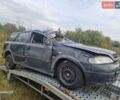 Черный Опель Астра, объемом двигателя 1.6 л и пробегом 250 тыс. км за 350 $, фото 2 на Automoto.ua