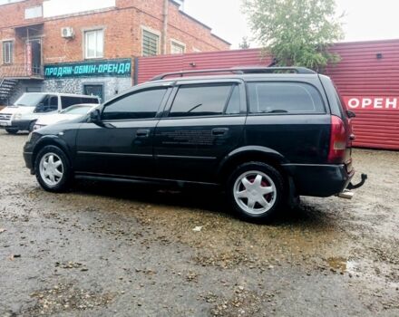 Черный Опель Астра, объемом двигателя 1.6 л и пробегом 350 тыс. км за 2650 $, фото 2 на Automoto.ua