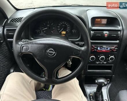Черный Опель Астра, объемом двигателя 2 л и пробегом 340 тыс. км за 3900 $, фото 111 на Automoto.ua