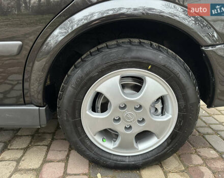 Черный Опель Астра, объемом двигателя 2 л и пробегом 337 тыс. км за 3850 $, фото 31 на Automoto.ua