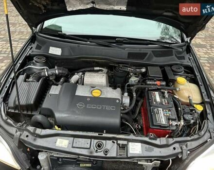 Черный Опель Астра, объемом двигателя 2 л и пробегом 340 тыс. км за 3900 $, фото 91 на Automoto.ua