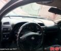 Черный Опель Астра, объемом двигателя 1.7 л и пробегом 300 тыс. км за 3500 $, фото 5 на Automoto.ua