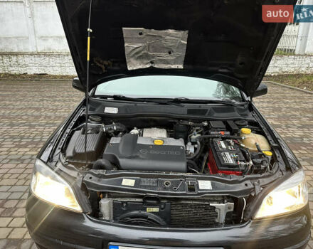 Черный Опель Астра, объемом двигателя 2 л и пробегом 337 тыс. км за 3850 $, фото 89 на Automoto.ua