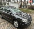 Черный Опель Астра, объемом двигателя 2 л и пробегом 340 тыс. км за 3900 $, фото 1 на Automoto.ua
