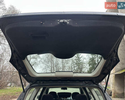 Черный Опель Астра, объемом двигателя 2 л и пробегом 337 тыс. км за 3850 $, фото 105 на Automoto.ua