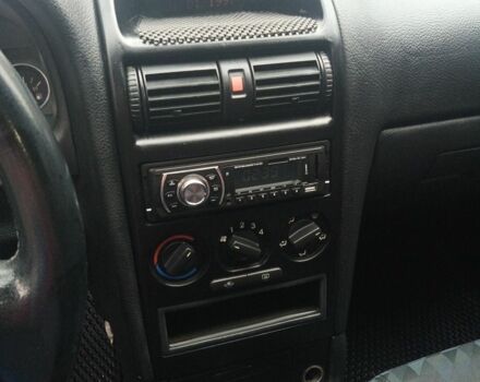 Черный Опель Астра, объемом двигателя 1.6 л и пробегом 350 тыс. км за 2650 $, фото 17 на Automoto.ua