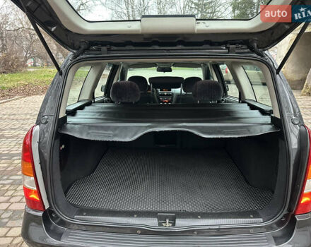 Черный Опель Астра, объемом двигателя 2 л и пробегом 337 тыс. км за 3850 $, фото 92 на Automoto.ua