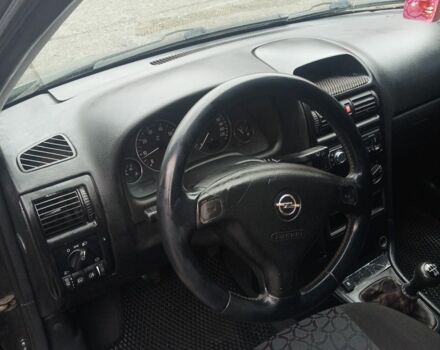 Черный Опель Астра, объемом двигателя 1.6 л и пробегом 350 тыс. км за 2650 $, фото 22 на Automoto.ua