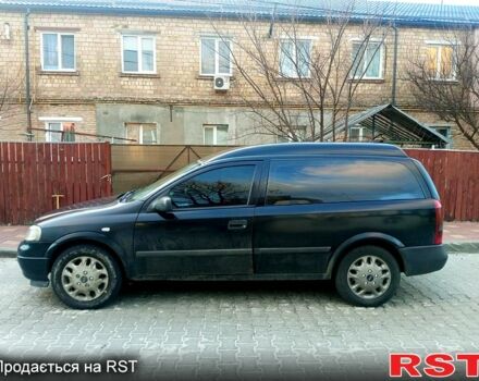 Черный Опель Астра, объемом двигателя 1.7 л и пробегом 300 тыс. км за 3500 $, фото 3 на Automoto.ua