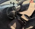 Черный Опель Астра, объемом двигателя 1.6 л и пробегом 303 тыс. км за 3000 $, фото 1 на Automoto.ua