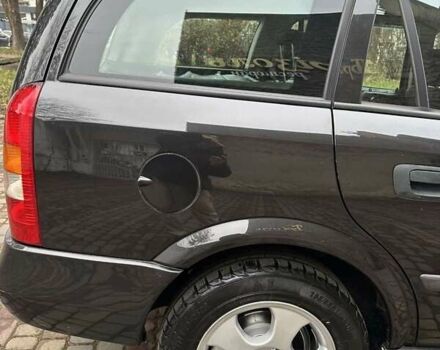 Черный Опель Астра, объемом двигателя 2 л и пробегом 340 тыс. км за 3900 $, фото 36 на Automoto.ua