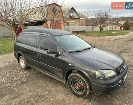 Черный Опель Астра, объемом двигателя 1.7 л и пробегом 300 тыс. км за 1200 $, фото 1 на Automoto.ua
