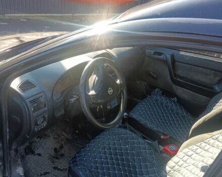 Черный Опель Астра, объемом двигателя 5 л и пробегом 330 тыс. км за 1420 $, фото 2 на Automoto.ua