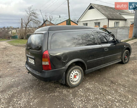 Черный Опель Астра, объемом двигателя 1.7 л и пробегом 300 тыс. км за 1200 $, фото 2 на Automoto.ua