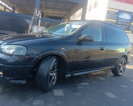 Черный Опель Астра, объемом двигателя 5 л и пробегом 330 тыс. км за 1420 $, фото 1 на Automoto.ua