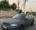 Черный Опель Астра, объемом двигателя 2 л и пробегом 455 тыс. км за 1100 $, фото 1 на Automoto.ua