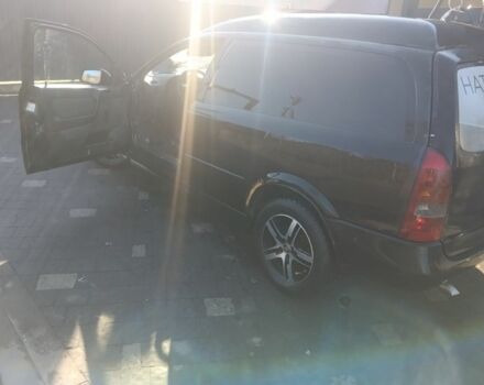 Черный Опель Астра, объемом двигателя 5 л и пробегом 330 тыс. км за 1420 $, фото 4 на Automoto.ua