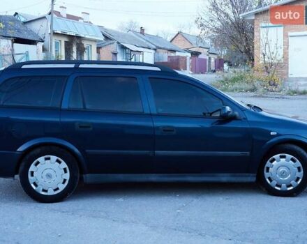 Черный Опель Астра, объемом двигателя 1.7 л и пробегом 270 тыс. км за 3900 $, фото 4 на Automoto.ua