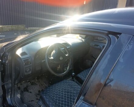 Черный Опель Астра, объемом двигателя 5 л и пробегом 330 тыс. км за 1420 $, фото 5 на Automoto.ua