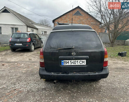 Черный Опель Астра, объемом двигателя 1.7 л и пробегом 300 тыс. км за 1200 $, фото 3 на Automoto.ua
