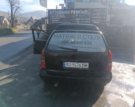 Черный Опель Астра, объемом двигателя 5 л и пробегом 330 тыс. км за 1420 $, фото 3 на Automoto.ua