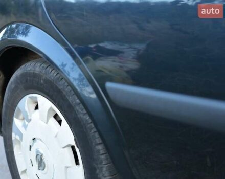 Черный Опель Астра, объемом двигателя 1.7 л и пробегом 270 тыс. км за 3900 $, фото 8 на Automoto.ua