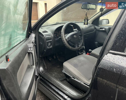 Черный Опель Астра, объемом двигателя 1.6 л и пробегом 250 тыс. км за 2650 $, фото 12 на Automoto.ua