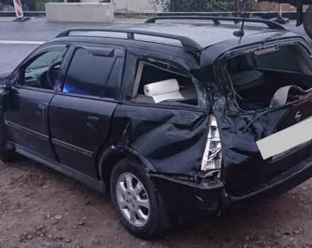 Черный Опель Астра, объемом двигателя 1.4 л и пробегом 340 тыс. км за 800 $, фото 3 на Automoto.ua