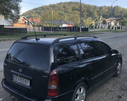 Черный Опель Астра, объемом двигателя 2 л и пробегом 320 тыс. км за 4100 $, фото 3 на Automoto.ua