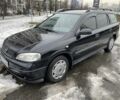 Чорний Опель Астра, об'ємом двигуна 1.6 л та пробігом 235 тис. км за 2999 $, фото 1 на Automoto.ua