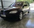 Черный Опель Астра, объемом двигателя 1.6 л и пробегом 280 тыс. км за 3900 $, фото 1 на Automoto.ua