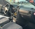 Черный Опель Астра, объемом двигателя 1.6 л и пробегом 290 тыс. км за 3300 $, фото 12 на Automoto.ua