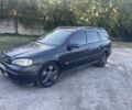 Черный Опель Астра, объемом двигателя 2 л и пробегом 200 тыс. км за 950 $, фото 1 на Automoto.ua