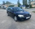 Черный Опель Астра, объемом двигателя 1.6 л и пробегом 241 тыс. км за 4500 $, фото 1 на Automoto.ua