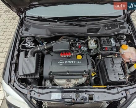 Черный Опель Астра, объемом двигателя 1.6 л и пробегом 280 тыс. км за 3850 $, фото 18 на Automoto.ua