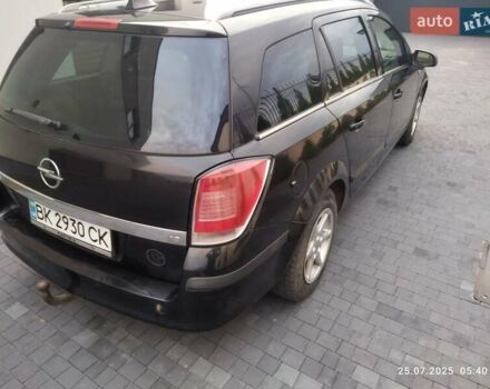 Черный Опель Астра, объемом двигателя 1.8 л и пробегом 218 тыс. км за 3500 $, фото 4 на Automoto.ua