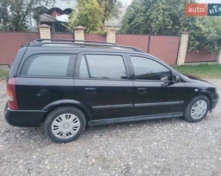 Черный Опель Астра, объемом двигателя 1.6 л и пробегом 232 тыс. км за 3000 $, фото 7 на Automoto.ua