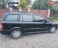 Черный Опель Астра, объемом двигателя 1.6 л и пробегом 232 тыс. км за 3000 $, фото 7 на Automoto.ua