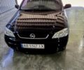 Черный Опель Астра, объемом двигателя 1.6 л и пробегом 280 тыс. км за 3900 $, фото 1 на Automoto.ua