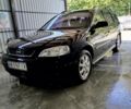 Черный Опель Астра, объемом двигателя 1.6 л и пробегом 280 тыс. км за 3900 $, фото 2 на Automoto.ua