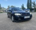 Черный Опель Астра, объемом двигателя 1.6 л и пробегом 241 тыс. км за 4500 $, фото 20 на Automoto.ua